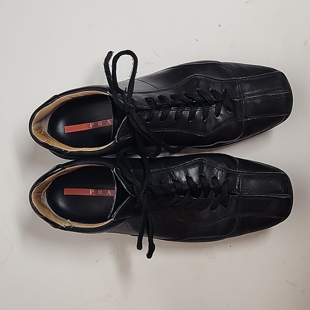 Prada black square toe lace up mens leather sneakers.  Made in Italy.  Quality.